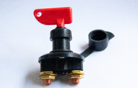 Battery disconnect switch used as a battery isolator in marine, transportation and automotive applications. The switch's handle is detachable, allowing it to be easily removed to deter tampering. It is water and dust rated up to IP54 and provides ignition